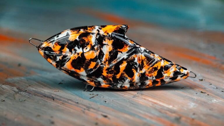 CS Jerk w kolorze Orange Koi, przynęta spinningowa do połowu drapieżników.